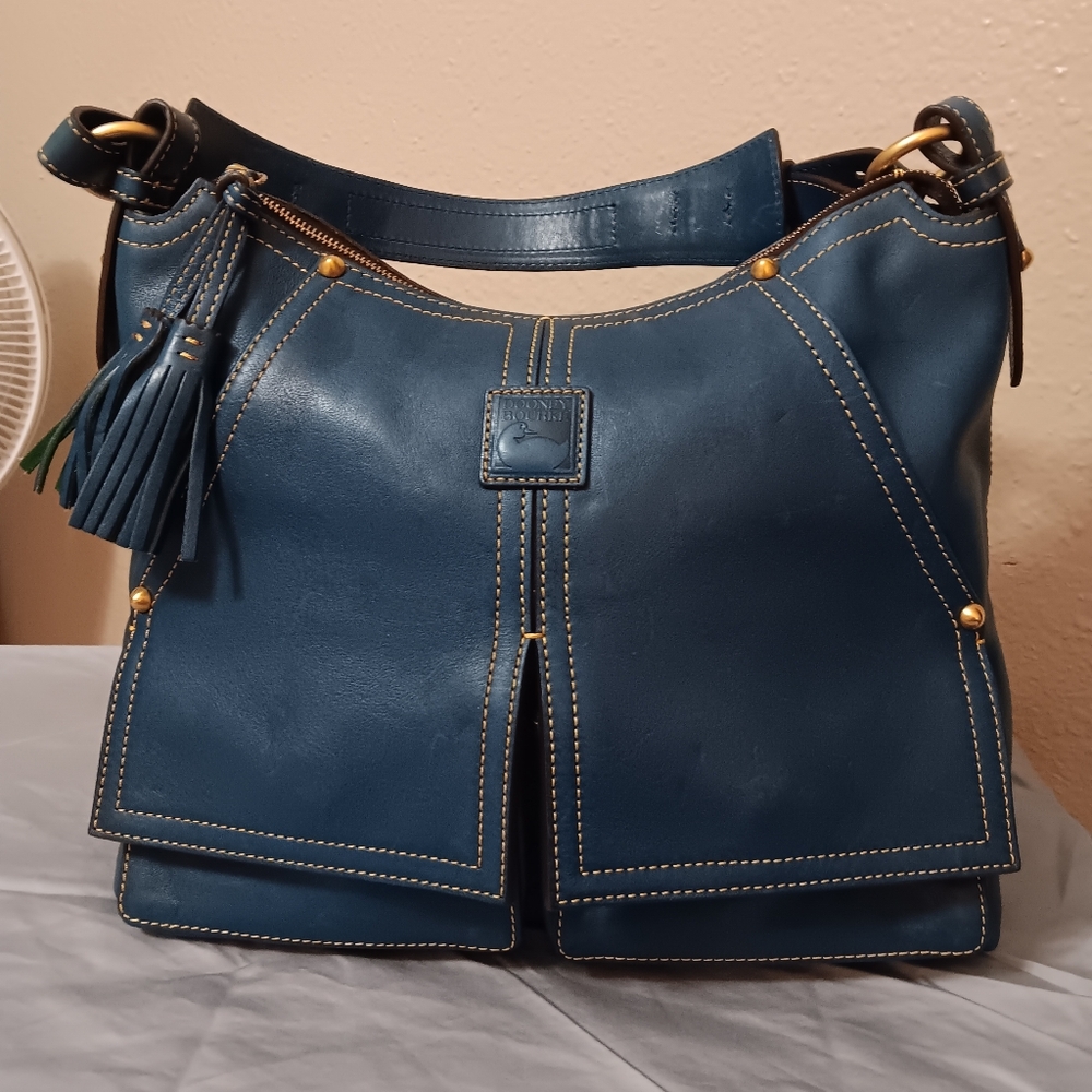 Dooney bourke Florentine Kingston denim blue with  patina and discoloration